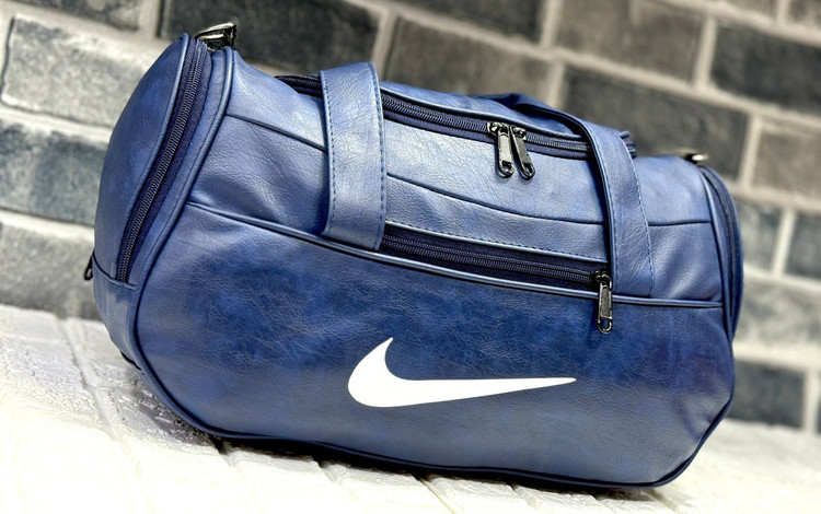 ساک طرح چرم زیپ جلو نایک کد ۲۰۰