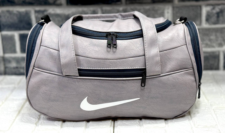 ساک طرح چرم زیپ جلو نایک با آستر خارجی و دوخت مغزی کاری شده کد ۲۰۰