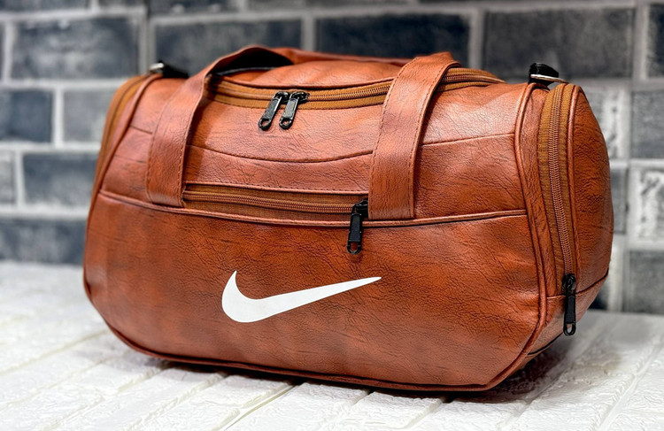 ساک طرح چرم زیپ جلو نایک با آستر خارجی و دوخت مغزی کاری شده کد ۲۰۰