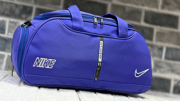 ساک ورزشی طرح چرم زیپ وسط جا کفشی دار با آستر خارجی نایک با کد محصول ۲۰۹